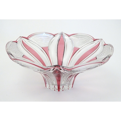 260 - A 20thC cut glass bowl with cranberry flash detail. 11 1/2