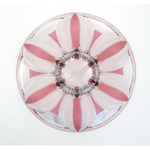 260 - A 20thC cut glass bowl with cranberry flash detail. 11 1/2