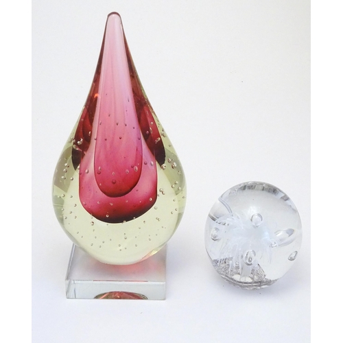 263 - A Murano sommerso glass teardrop on stand together with a paperweight. The tallest 8 3/4