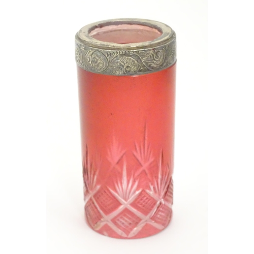 276 - A cut glass vase / spill vase with cranberry detail and silver rim. Approx 4 1/4