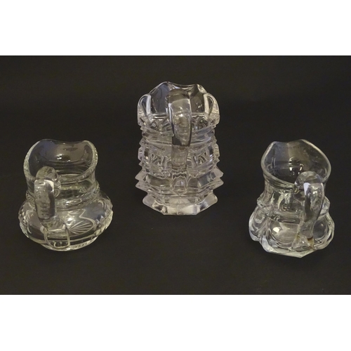 287 - Three assorted glass cream jugs. The tallest approx 5