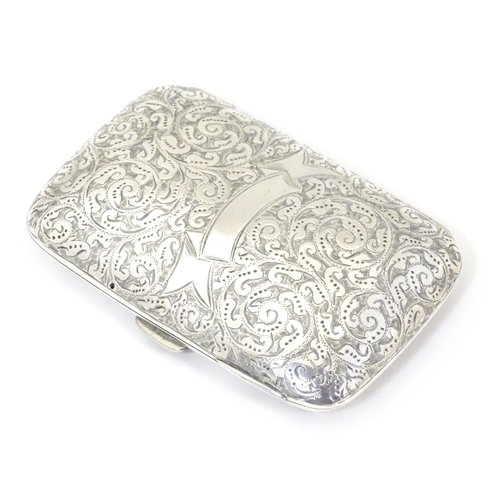 312 - A Victorian silver cigarette case with engraved decoration, hallmarked Birmingham 1894 maker Minshul... 