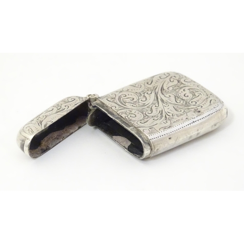 323 - A silver vesta case with engraved decoration, hallmarked Birmingham 1911 maker John Edward Wilmot. 1... 