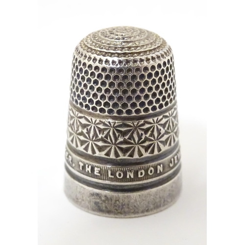 327 - A silver thimble hallmarked Chester 1928 James Walker Ltd. Approx 1