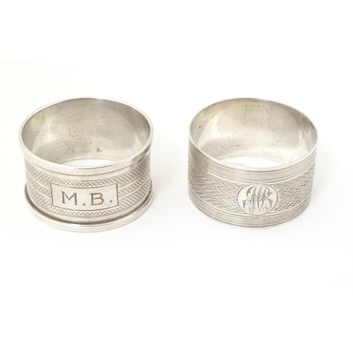 331 - Two silver napkin rings both with engine turned decoration, one hallmarked Birmingham 1927, maker F.... 