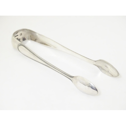 332 - Victorian Scottish silver sugar tongs hallmarked Glasgow 1873, maker John Miller & Co.  Approx. 6