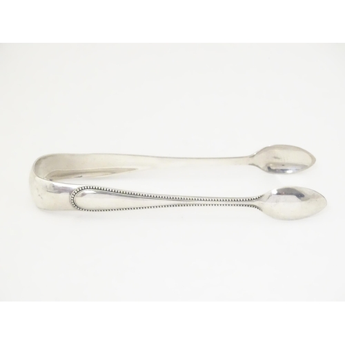 332 - Victorian Scottish silver sugar tongs hallmarked Glasgow 1873, maker John Miller & Co.  Approx. 6