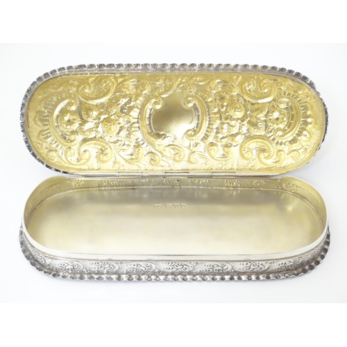 333 - A Victorian silver dressing table box with embossed decoration and hinged lid, hallmarked Chester 18... 