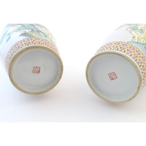 55 - A pair of large Chinese vases decorated with peacock birds in a tree, with banded detail and flowers... 