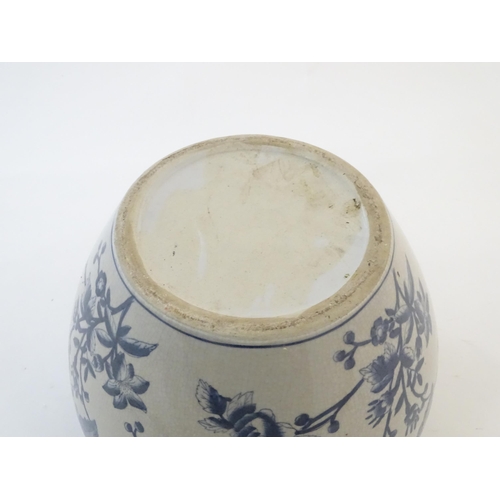 61 - A Chinese blue and white planter / jardiniere with floral and foliate detail, the interior decorated... 