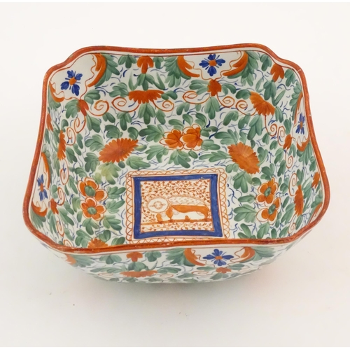 70 - A Minton squared bowl in the Crazy Cow pattern with flowers, foliage and central stylised animal det... 