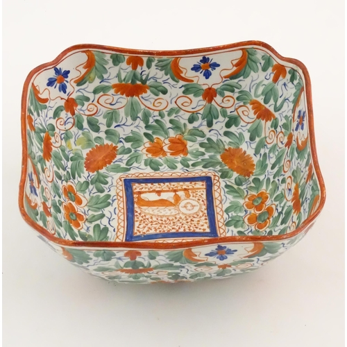 70 - A Minton squared bowl in the Crazy Cow pattern with flowers, foliage and central stylised animal det... 