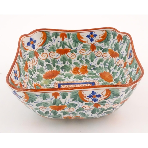 70 - A Minton squared bowl in the Crazy Cow pattern with flowers, foliage and central stylised animal det... 