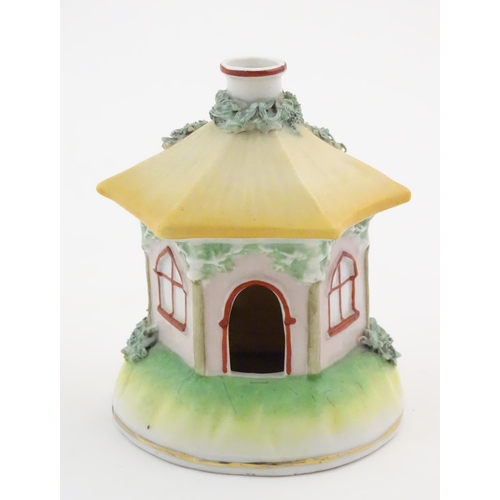 78 - A Staffordshire pottery pastille burner modelled as a cottage. Approx. 4