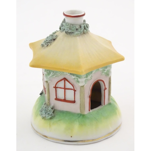 78 - A Staffordshire pottery pastille burner modelled as a cottage. Approx. 4