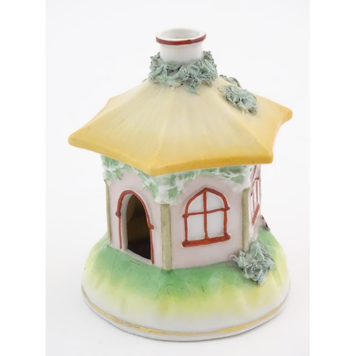 78 - A Staffordshire pottery pastille burner modelled as a cottage. Approx. 4