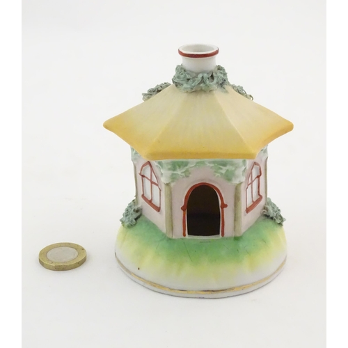 78 - A Staffordshire pottery pastille burner modelled as a cottage. Approx. 4