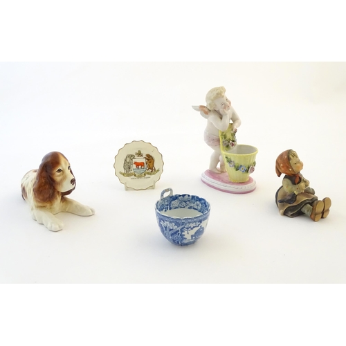 98 - A quantity of assorted ceramic items to include a blue and white tea bowl, a Continental putto with ... 