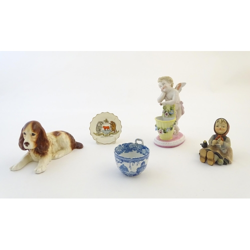 98 - A quantity of assorted ceramic items to include a blue and white tea bowl, a Continental putto with ... 