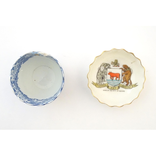 98 - A quantity of assorted ceramic items to include a blue and white tea bowl, a Continental putto with ... 