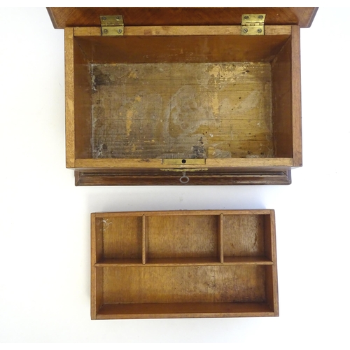 1188 - A 20thC Continental jewellery box of casket form with scroll detail to lid and fitted lift out tray ... 