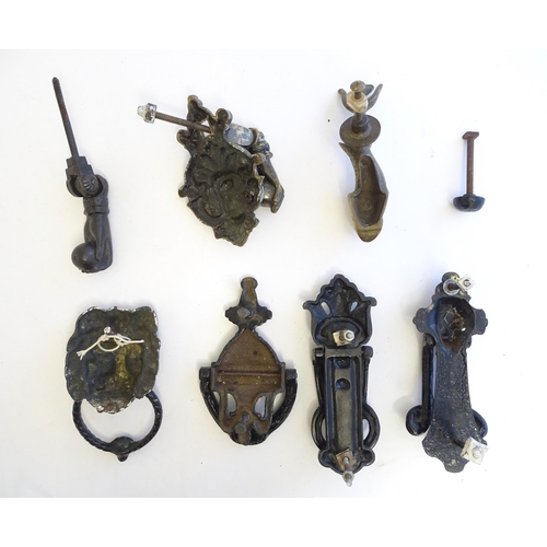 1193 - A quantity of assorted 19thC and later door knockers to include Georgian dolphin with trident tail, ... 