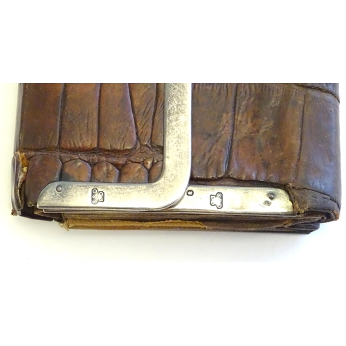 1214 - Three Victorian leather purses / wallets with silver mounts, one hallmarked London 1892, maker Drew ... 