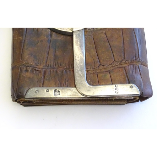 1214 - Three Victorian leather purses / wallets with silver mounts, one hallmarked London 1892, maker Drew ... 