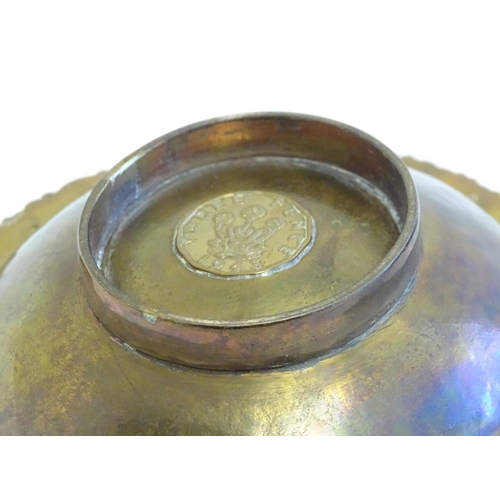 1215 - A pair of Scottish brass quaich with Celtic decoration and inset 1943 threepence coin. Approx. 7 3/4... 