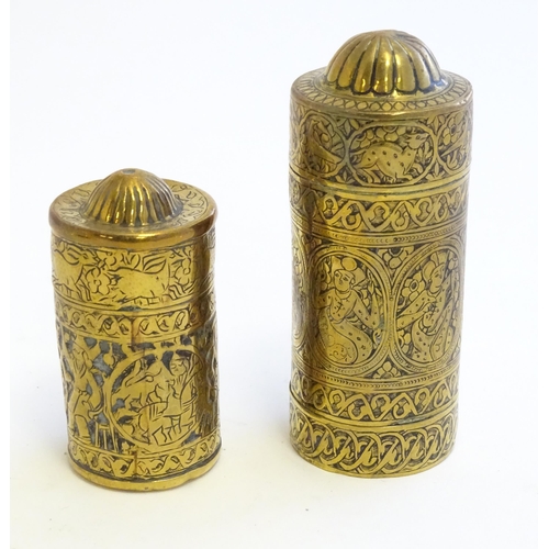 1217 - Two Persian brass containers with engraved banded decoration depicting oval vignettes with deity sty... 