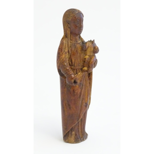 1220 - A 19thC Continental carved wooden model of mother and child, possible Madonna & Child. Approx. 5