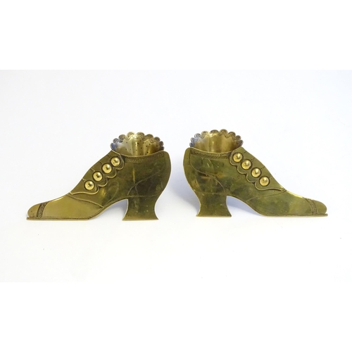 1222 - A pair of Victorian brass novelty posy holders formed as shoes. Approx. 2 1/2