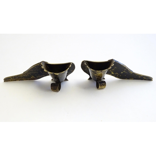 1222 - A pair of Victorian brass novelty posy holders formed as shoes. Approx. 2 1/2