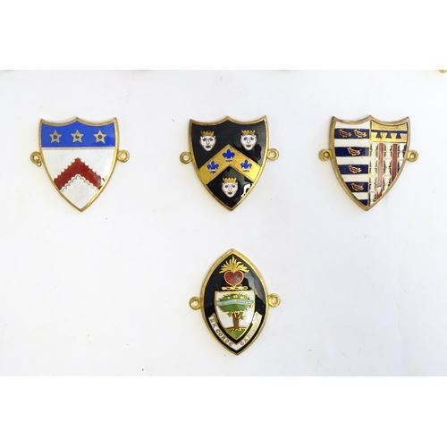 1232 - A collection of gilt metal enamelled collegiate insignia / badges, to include Keble College Oxford, ... 