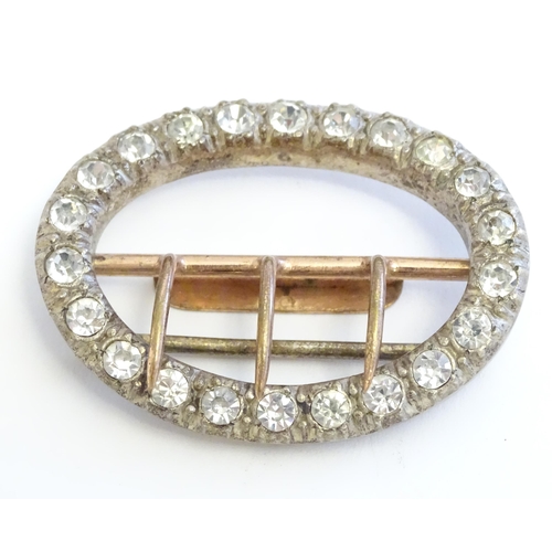 1236 - A 19thC buckle with paste stone detail. Approx. 1 3/4