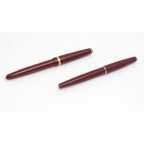 1239 - Two mid 20thC fountain pens, comprising a Conway 57 with 14ct gold nib, together with another by Par... 