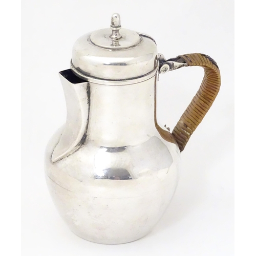 311 - An Edwardian silver hot water jug formed as a Channel Islands creamer, hallmarked Birmingham 1904, m... 