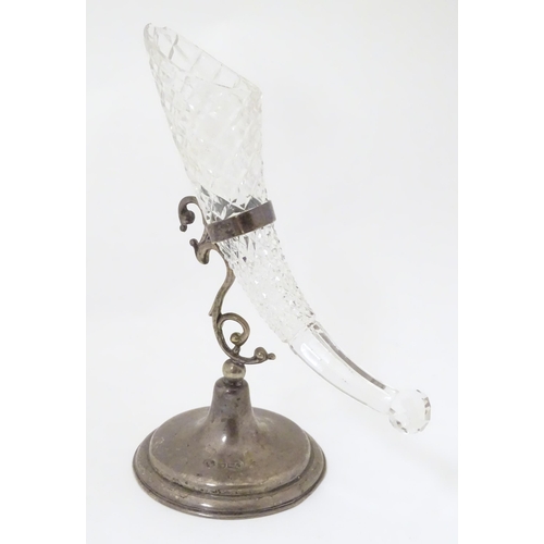 329 - A Victorian cut glass epergne flute on silver stand with scrolling stem and circular foot, hallmarke... 