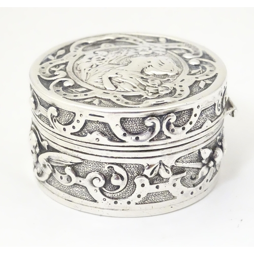 336 - An Art Nouveau silver box of circular form with hinged lid, with import mark and hallmark for Cheste... 