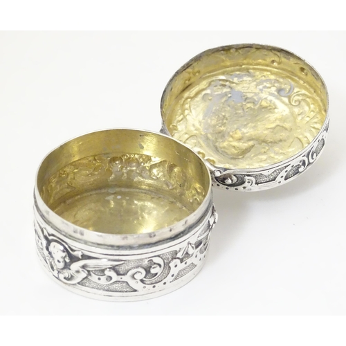 336 - An Art Nouveau silver box of circular form with hinged lid, with import mark and hallmark for Cheste... 