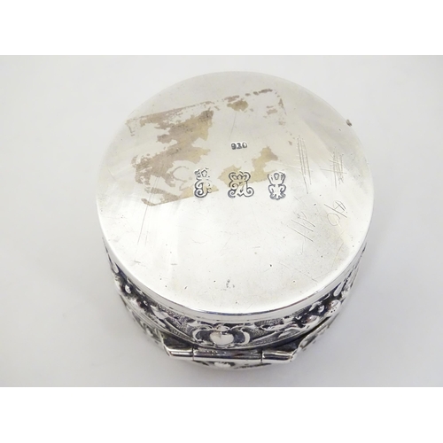 336 - An Art Nouveau silver box of circular form with hinged lid, with import mark and hallmark for Cheste... 