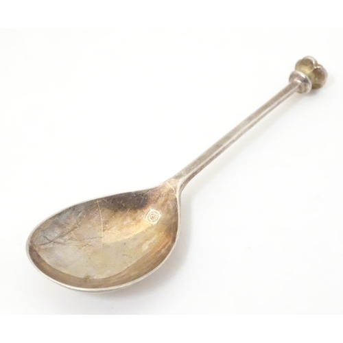 339 - A silver spoon with seal top handle, hallmarked Sheffield 2000, maker C. J. Vander. Approx. 4 3/4