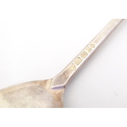 339 - A silver spoon with seal top handle, hallmarked Sheffield 2000, maker C. J. Vander. Approx. 4 3/4