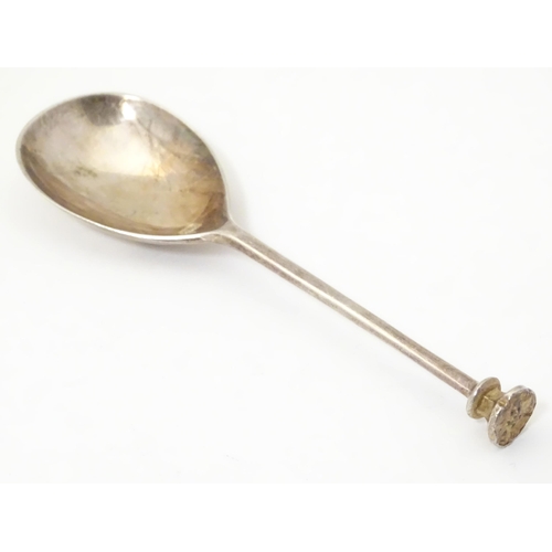 339 - A silver spoon with seal top handle, hallmarked Sheffield 2000, maker C. J. Vander. Approx. 4 3/4