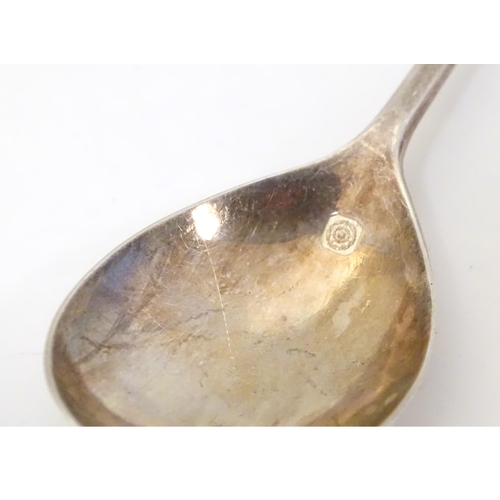 339 - A silver spoon with seal top handle, hallmarked Sheffield 2000, maker C. J. Vander. Approx. 4 3/4