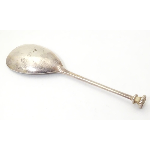 339 - A silver spoon with seal top handle, hallmarked Sheffield 2000, maker C. J. Vander. Approx. 4 3/4