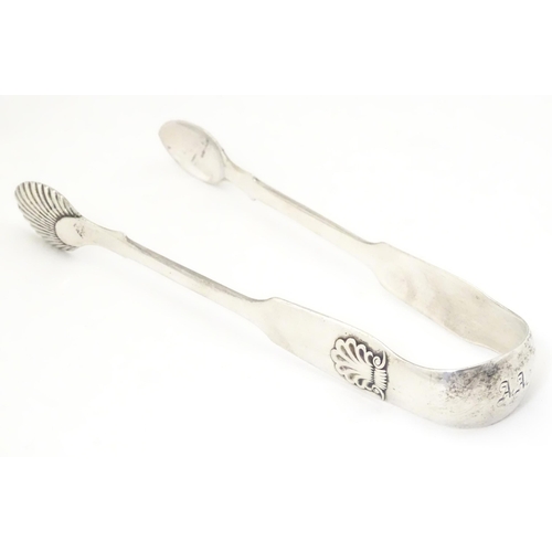 340 - Victorian Scottish silver sugar tongs with shell formed grips, hallmarked Edinburgh 1857, maker Jame... 