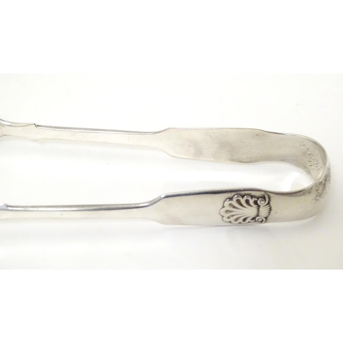 340 - Victorian Scottish silver sugar tongs with shell formed grips, hallmarked Edinburgh 1857, maker Jame... 