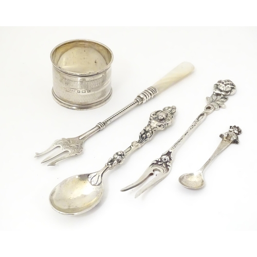 344 - Five assorted silver items to include a napkin ring, hallmarked Birmingham 1929, maker R. G. H., a s... 