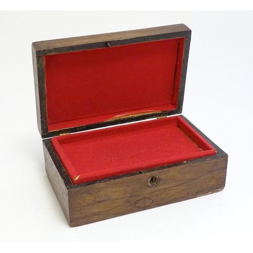 1168 - A late 19th / early 20thC walnut box with inlaid mother of pearl roundel detail to lid. Approx. 3 1/... 